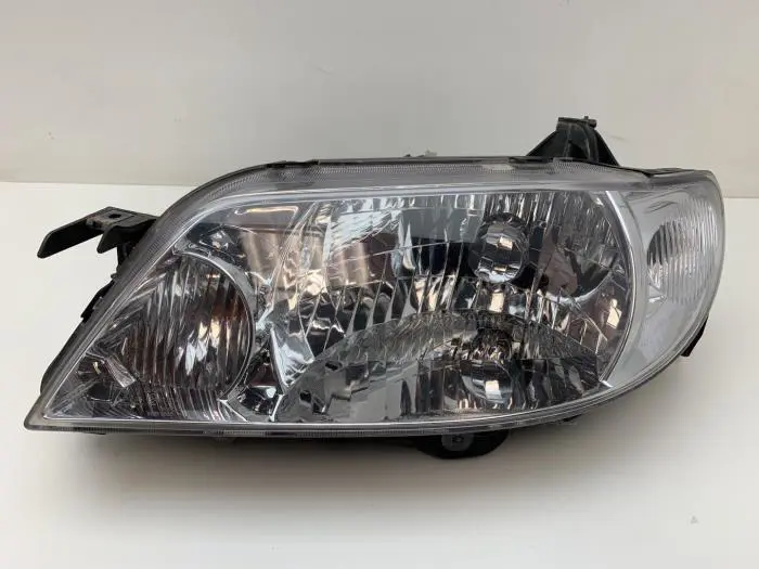 Headlight, left Mazda 323