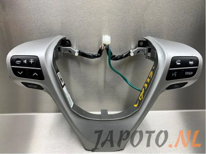 Steering wheel mounted radio control Toyota Verso