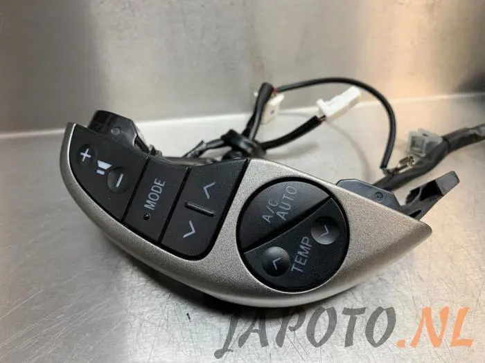 Steering wheel mounted radio control Toyota Prius