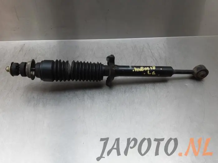 Rear shock absorber rod, left Mazda Demio