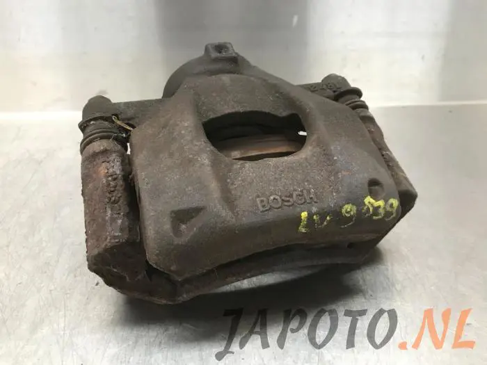 Front brake calliper, left Toyota Aygo
