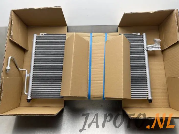 Air conditioning radiator Mazda 323F
