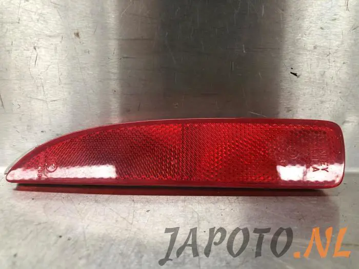 Rear bumper reflector, left Mazda 6.