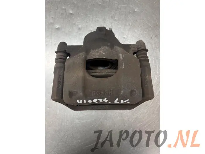 Front brake calliper, left Toyota Aygo