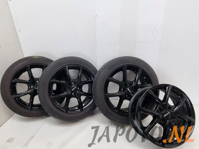 Sport rims set + tires Suzuki Swift