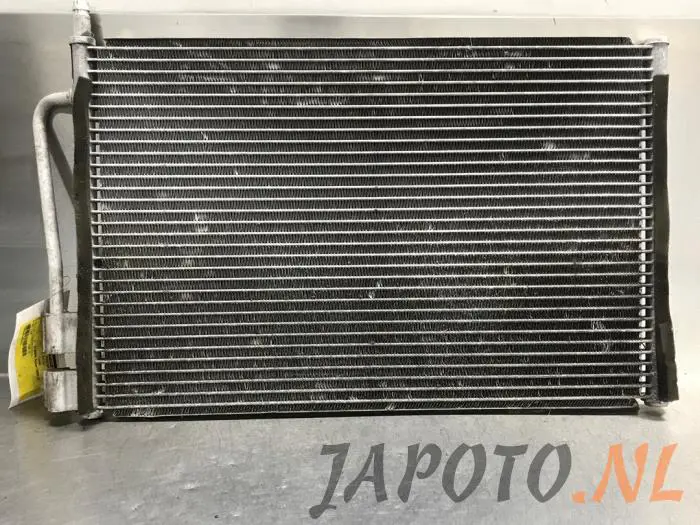 Air conditioning radiator Mazda 2.