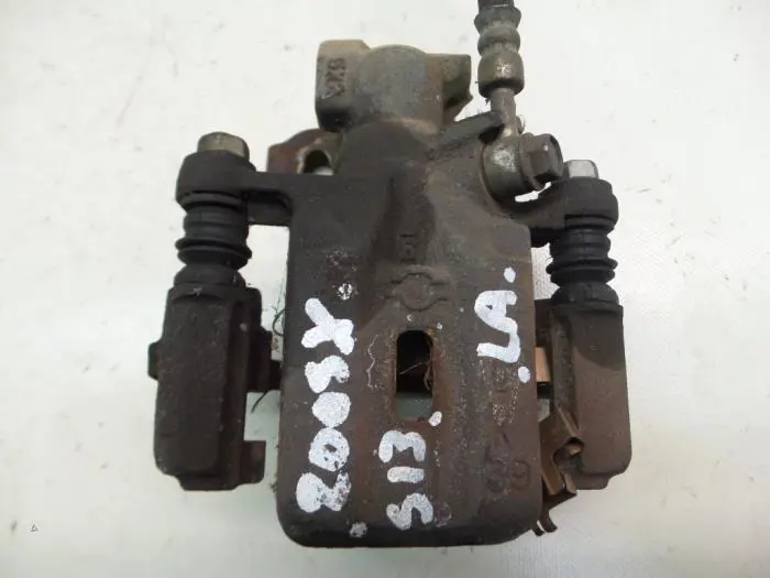 Rear brake calliper, left Nissan 200 SX