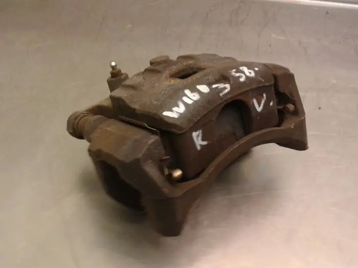 Front brake calliper, right Mazda 2.